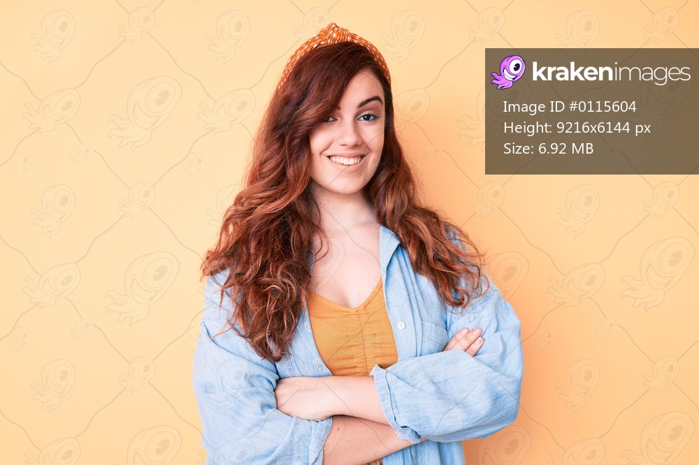 Young beautiful woman wearing casual clothes happy face smiling with crossed arms looking at the camera. positive person. 