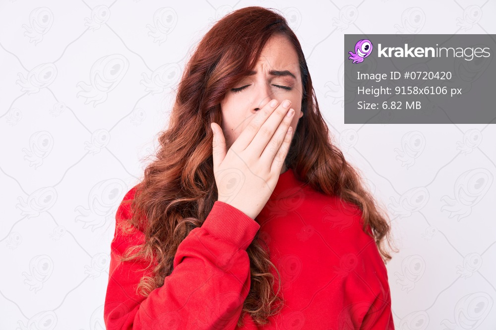 Young beautiful woman wearing casual clothes bored yawning tired covering mouth with hand. restless and sleepiness. 