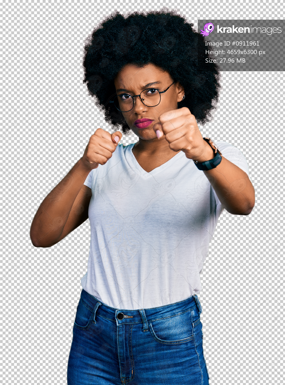 Young african american woman wearing casual white t shirt punching fist to fight, aggressive and angry attack, threat and violence