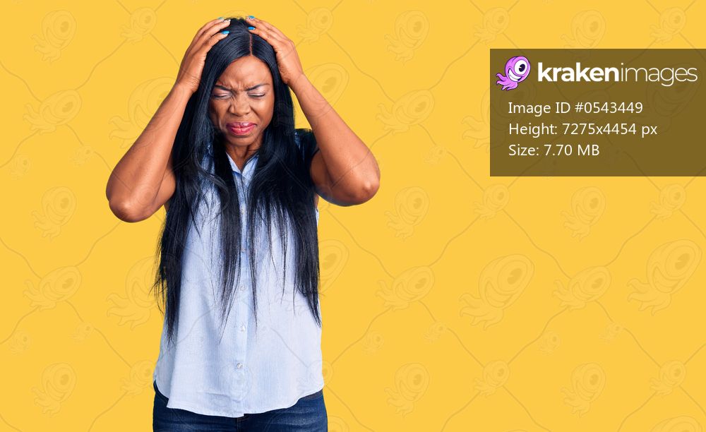 Young african american woman wearing casual clothes suffering from headache desperate and stressed because pain and migraine. hands on head. 
