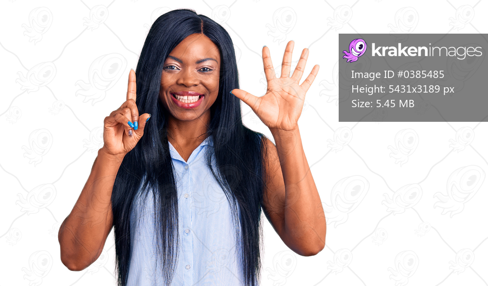 Young african american woman wearing casual clothes showing and pointing up with fingers number six while smiling confident and happy. 