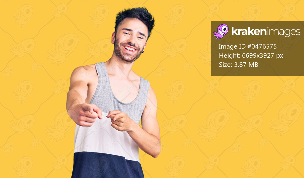 Young hispanic man wearing casual clothes pointing fingers to camera with happy and funny face. good energy and vibes. 