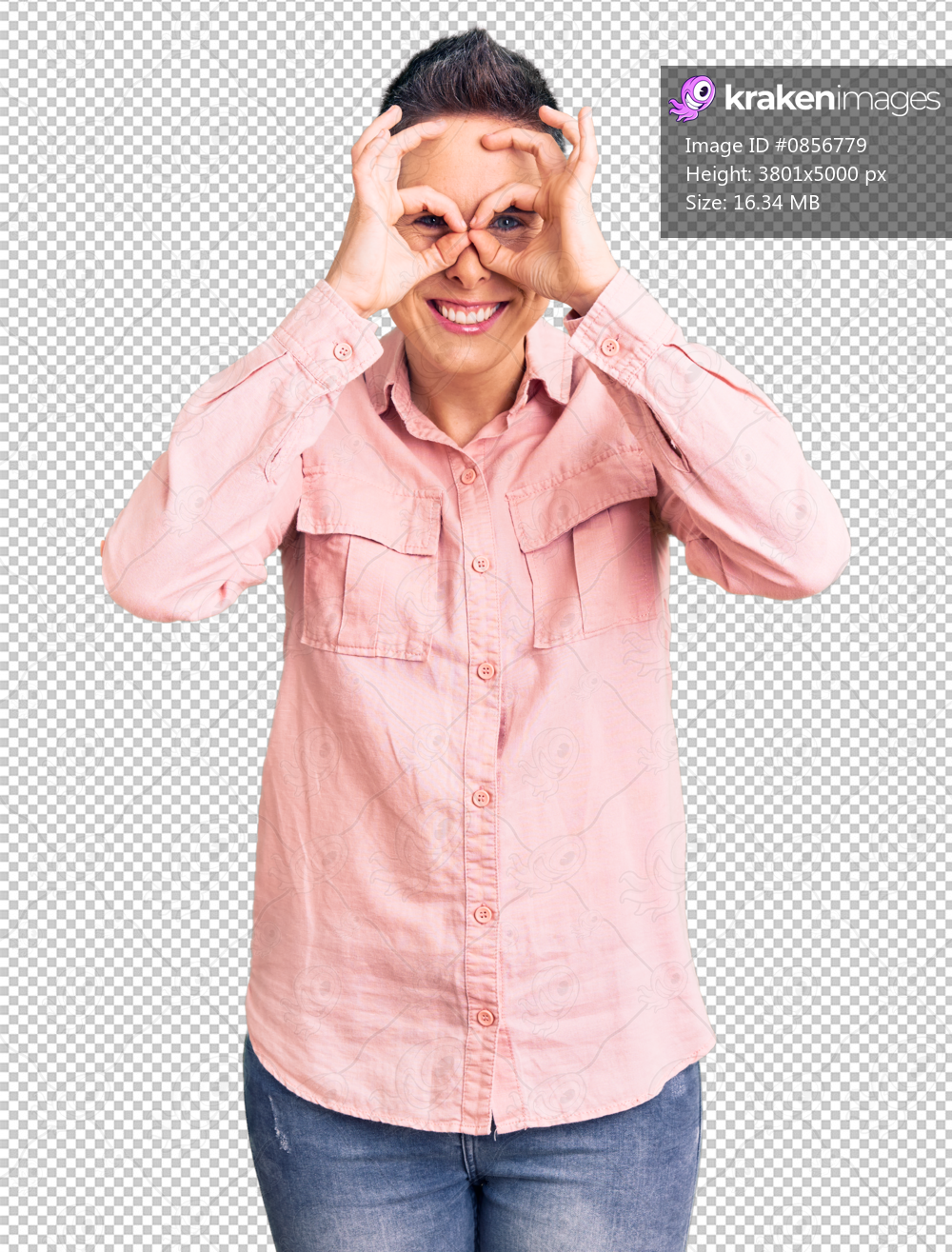Young woman with short hair wearing casual clothes doing ok gesture like binoculars sticking tongue out, eyes looking through fingers. crazy expression.