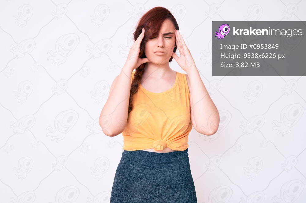 Young beautiful woman wearing casual clothes with hand on head, headache because stress. suffering migraine. 