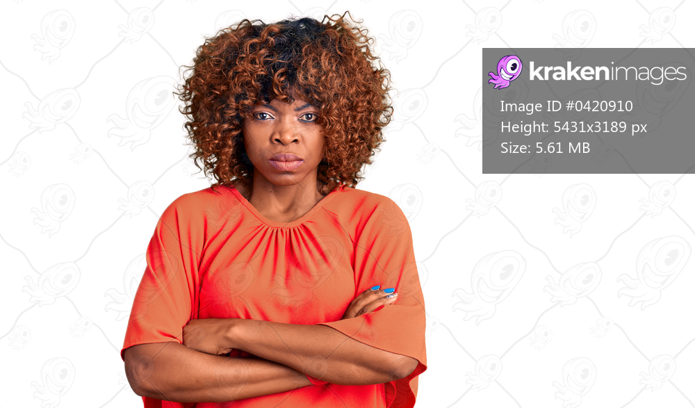 Young african american woman wearing casual clothes skeptic and nervous, disapproving expression on face with crossed arms. negative person. 
