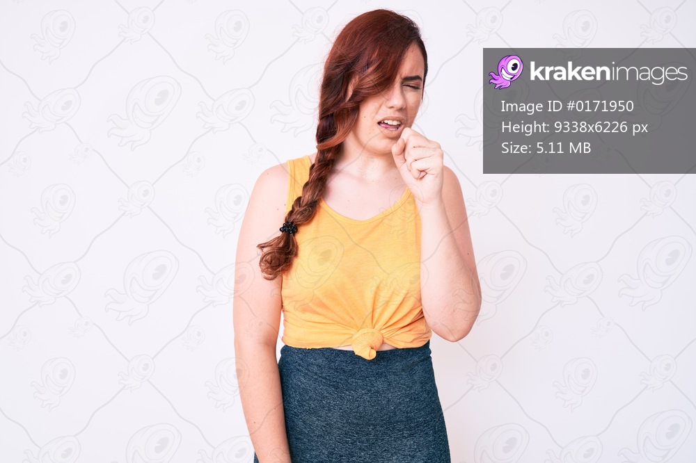 Young beautiful woman wearing casual clothes feeling unwell and coughing as symptom for cold or bronchitis. health care concept. 