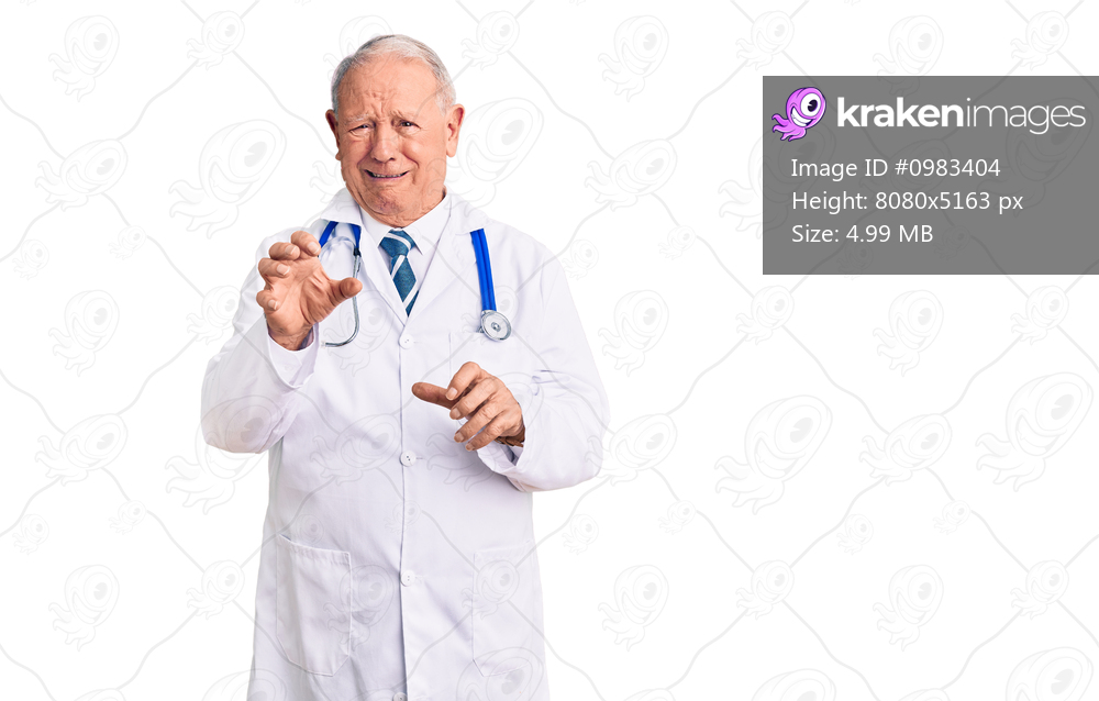 Senior handsome grey-haired man wearing doctor coat and stethoscope disgusted expression, displeased and fearful doing disgust face because aversion reaction. 