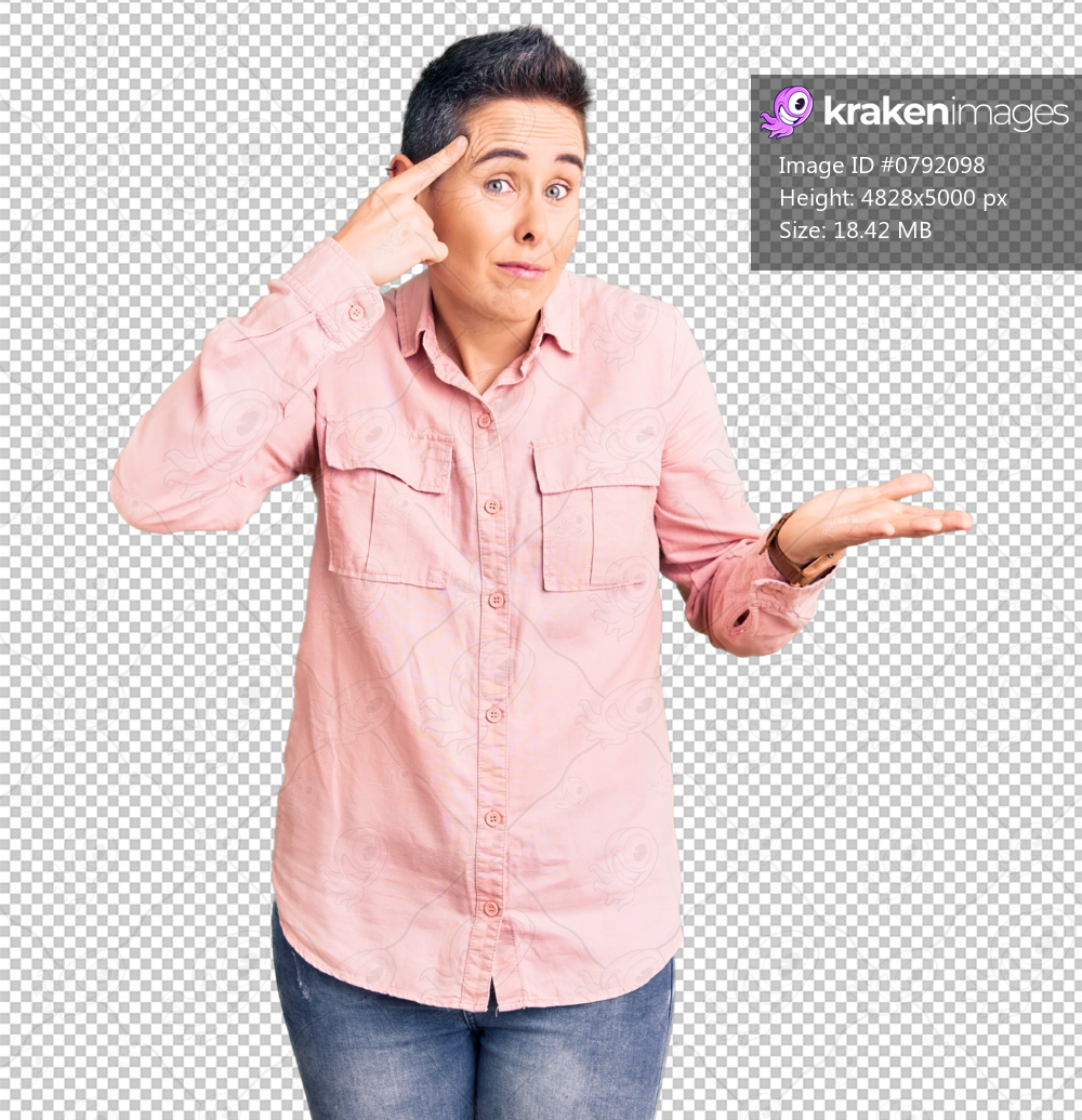 Young woman with short hair wearing casual clothes confused and annoyed with open palm showing copy space and pointing finger to forehead. think about it.