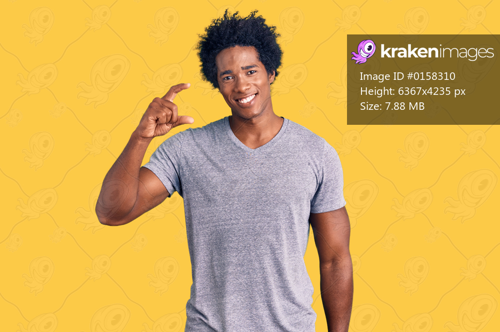 Handsome african american man with afro hair wearing casual clothes smiling and confident gesturing with hand doing small size sign with fingers looking and the camera. measure concept. 