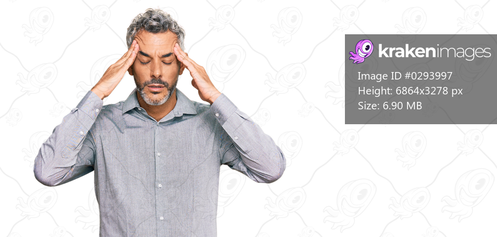 Middle age grey-haired man wearing casual clothes with hand on head for pain in head because stress. suffering migraine. 