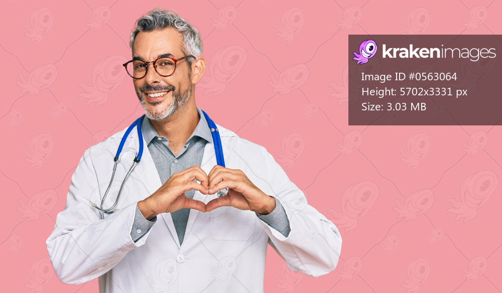 Middle age grey-haired man wearing doctor uniform and stethoscope smiling in love showing heart symbol and shape with hands. romantic concept. 