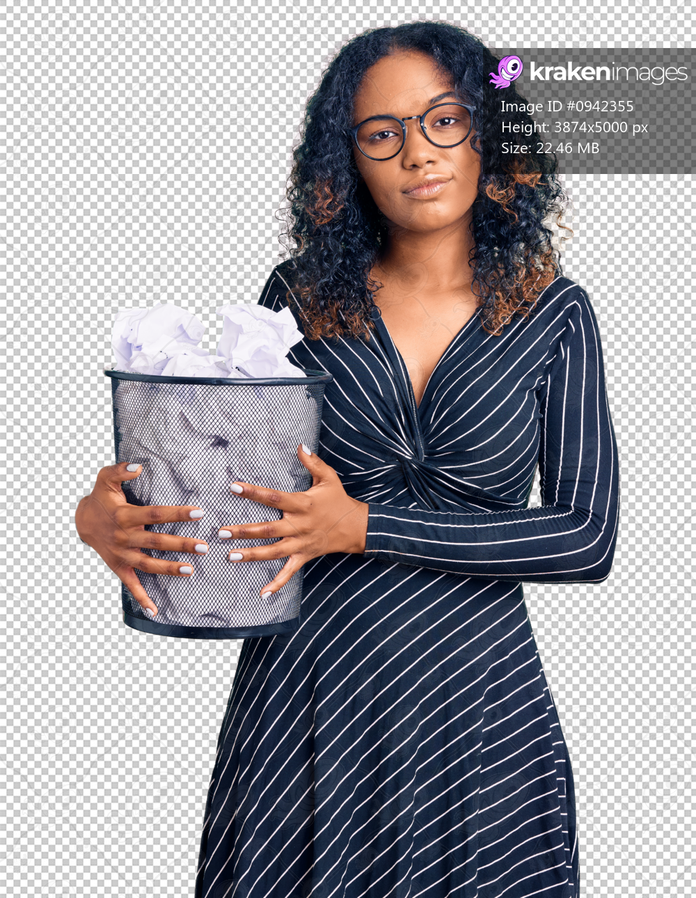 Young african american woman holding paper bin full of crumpled papers thinking attitude and sober expression looking self confident