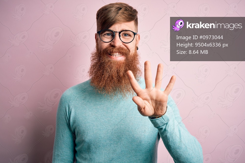 Handsome Irish redhead man with beard wearing glasses over pink isolated background showing and pointing up with fingers number four while smiling confident and happy.