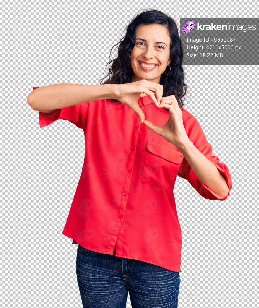 Young beautiful hispanic woman wearing casual clothes smiling in love doing heart symbol shape with hands. romantic concept.