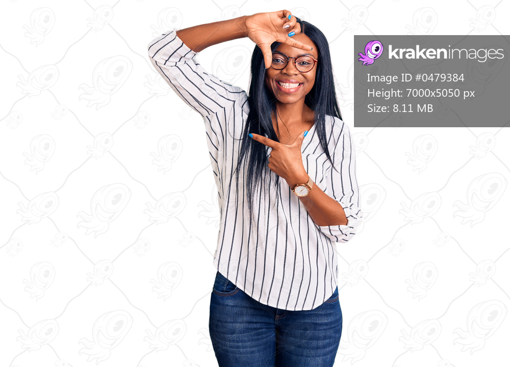 Young african american woman wearing casual clothes and glasses smiling making frame with hands and fingers with happy face. creativity and photography concept. 