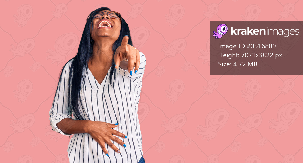 Young african american woman wearing casual clothes and glasses laughing at you, pointing finger to the camera with hand over body, shame expression 