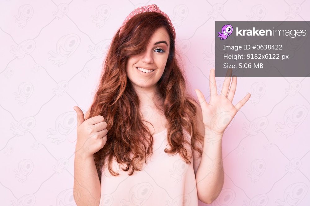 Young beautiful woman wearing casual clothes showing and pointing up with fingers number six while smiling confident and happy. 