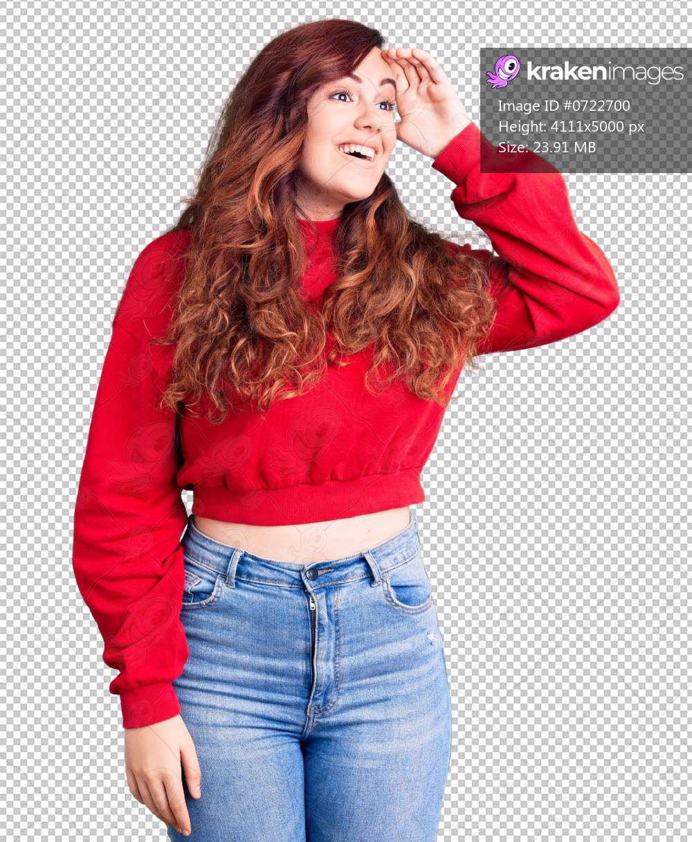 Young beautiful woman wearing casual winter sweater very happy and smiling looking far away with hand over head. searching concept.