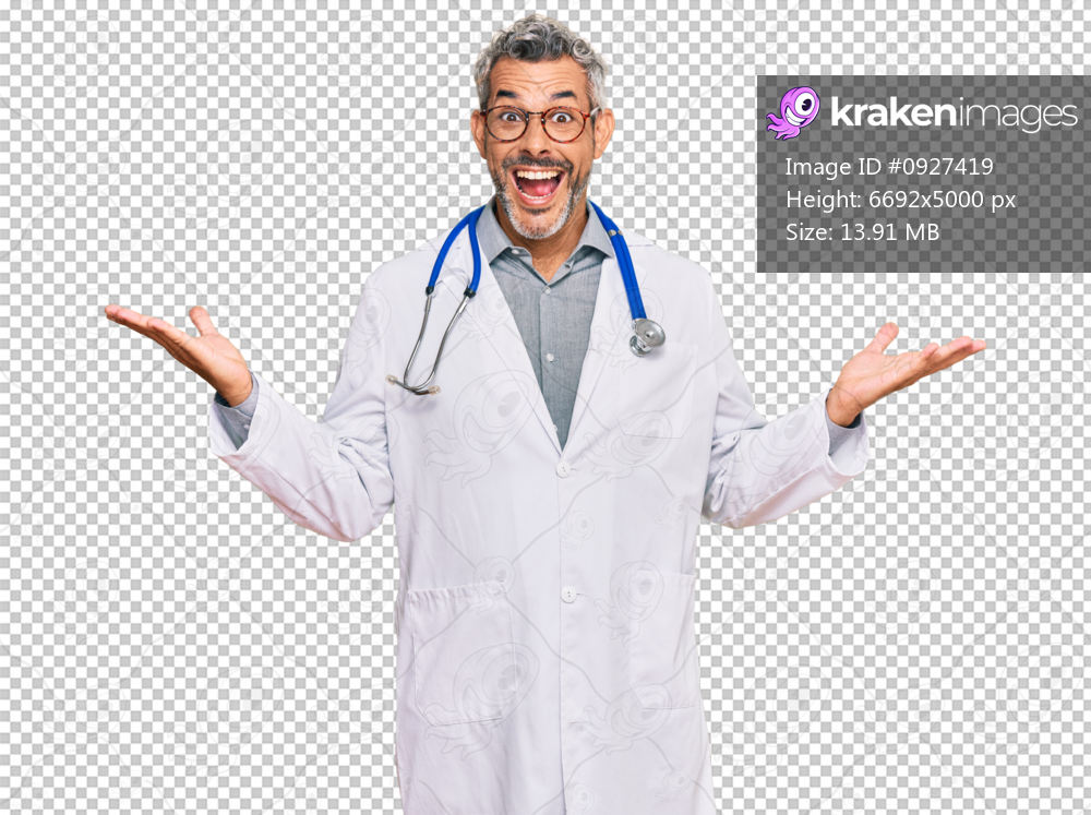 Middle age grey-haired man wearing doctor uniform and stethoscope celebrating victory with happy smile and winner expression with raised hands