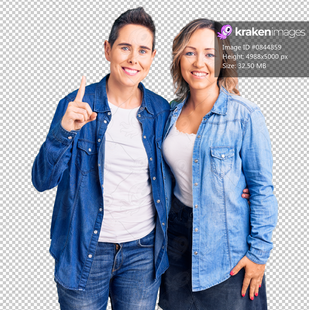Couple of women wearing casual clothes showing and pointing up with finger number one while smiling confident and happy.