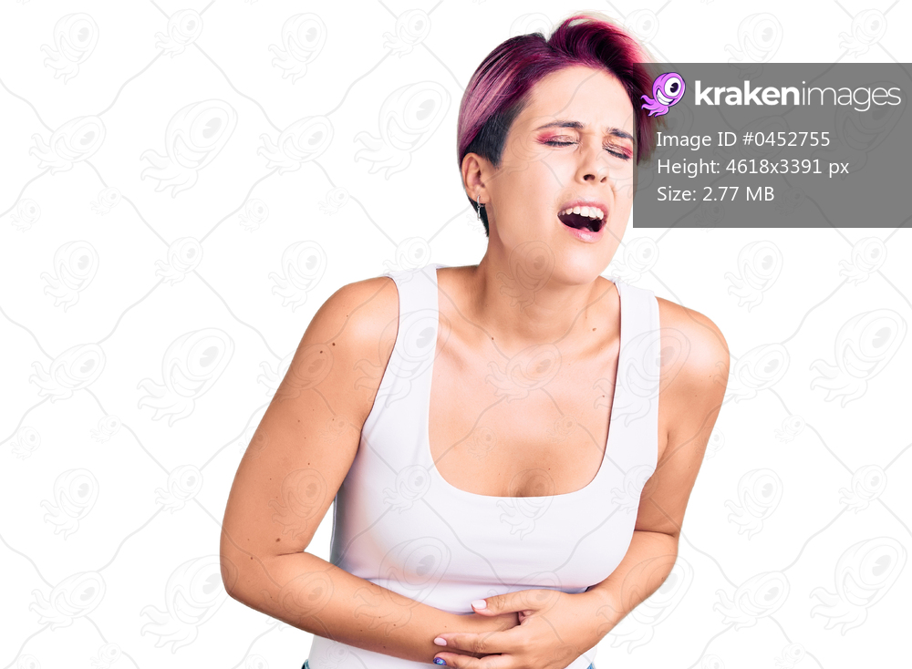 Young beautiful woman with pink hair wearing casual clothes with hand on stomach because nausea, painful disease feeling unwell. ache concept. 