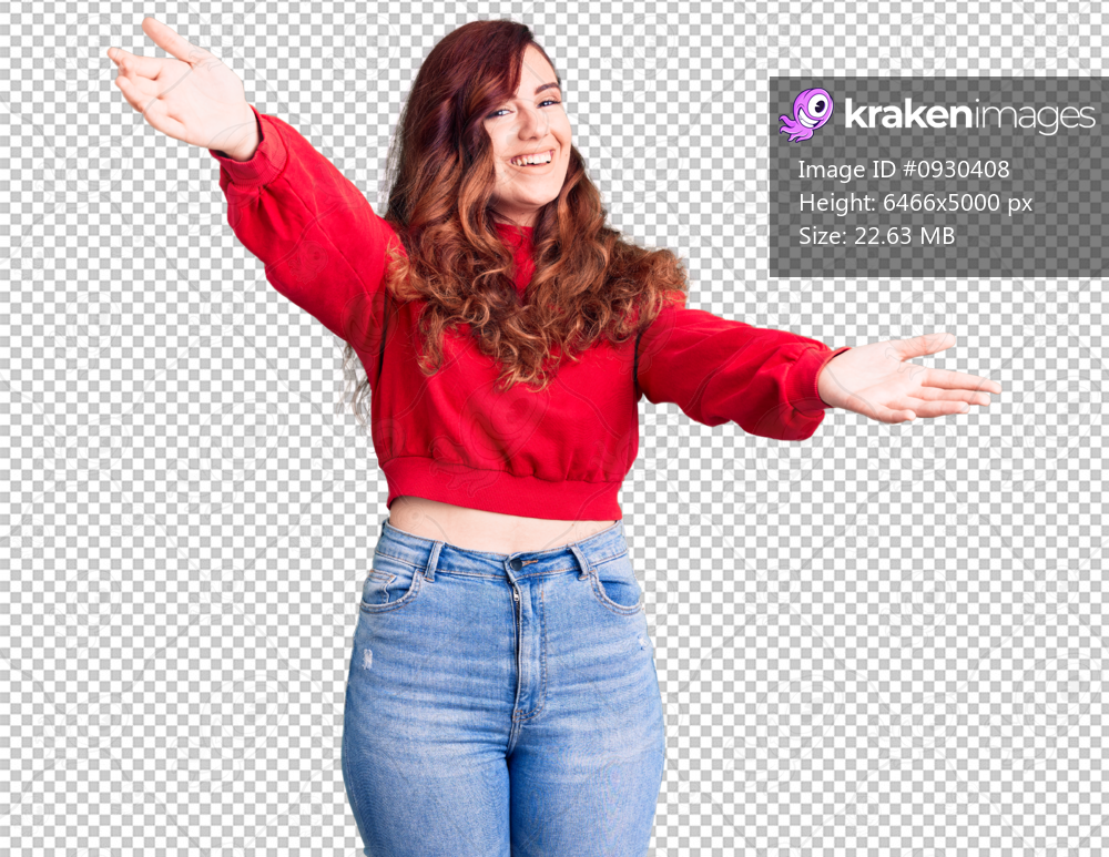 Young beautiful woman wearing casual winter sweater looking at the camera smiling with open arms for hug. cheerful expression embracing happiness.