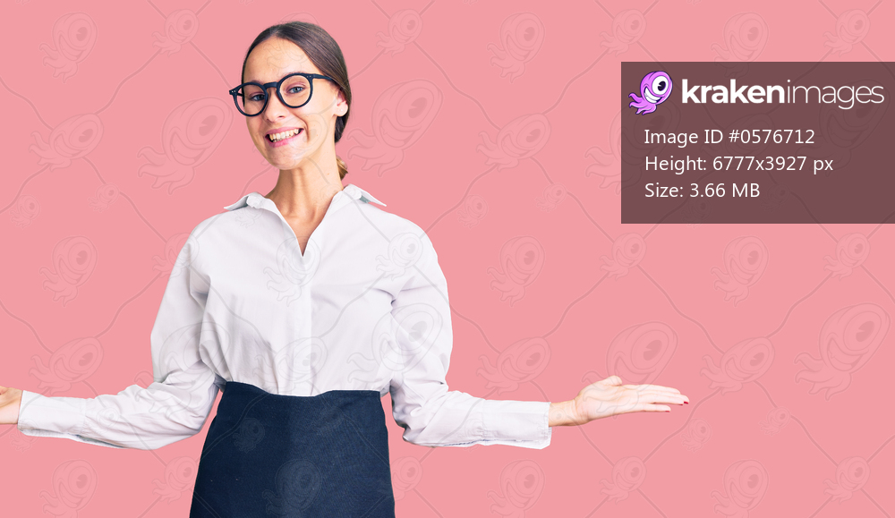 Beautiful brunette young woman wearing professional waitress apron smiling showing both hands open palms, presenting and advertising comparison and balance 