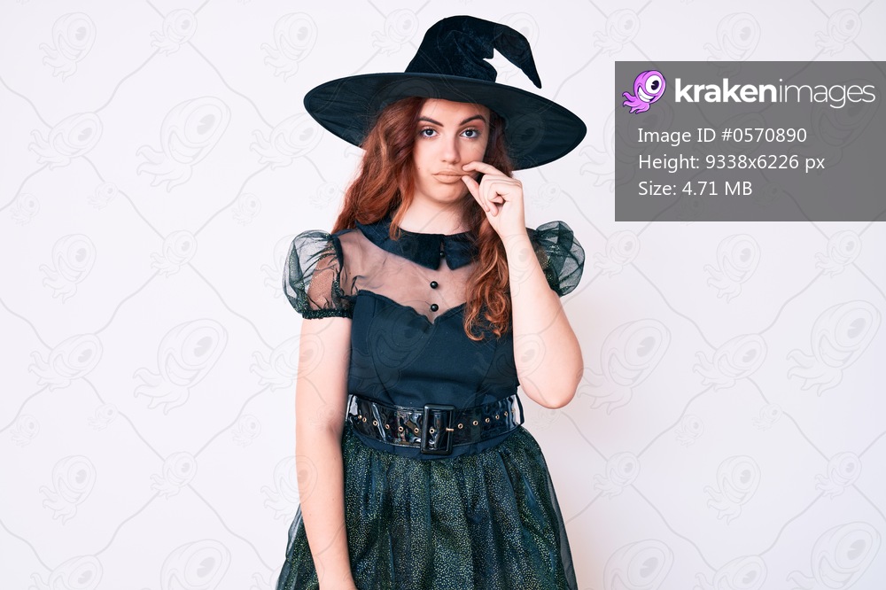 Young beautiful woman wearing witch halloween costume mouth and lips shut as zip with fingers. secret and silent, taboo talking 