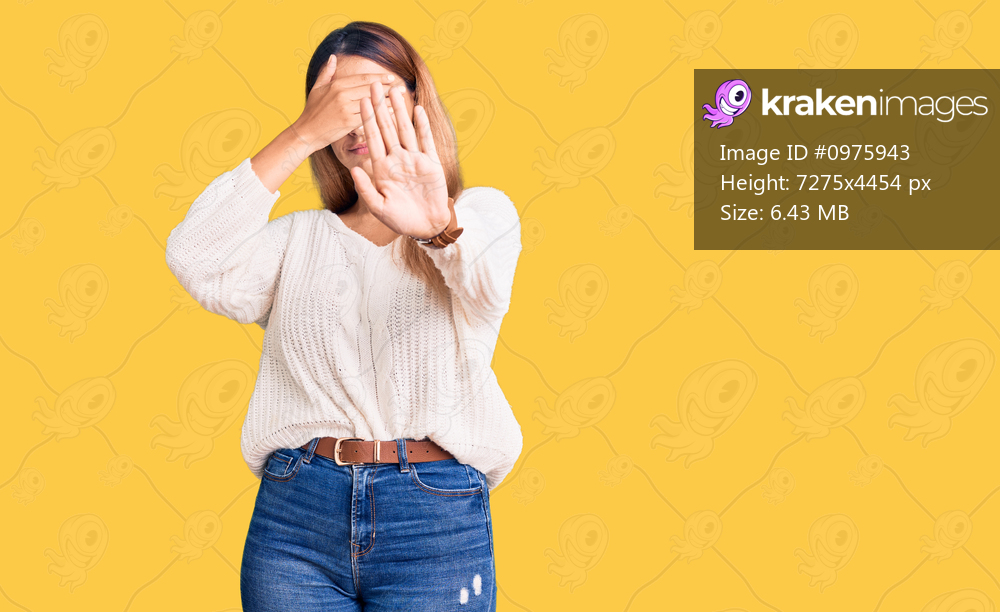 Beautiful young woman wearing casual clothes covering eyes with hands and doing stop gesture with sad and fear expression. embarrassed and negative concept. 