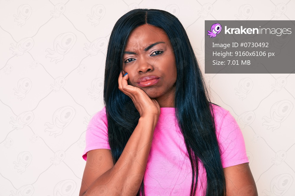 Young african american woman wearing casual clothes thinking looking tired and bored with depression problems with crossed arms. 